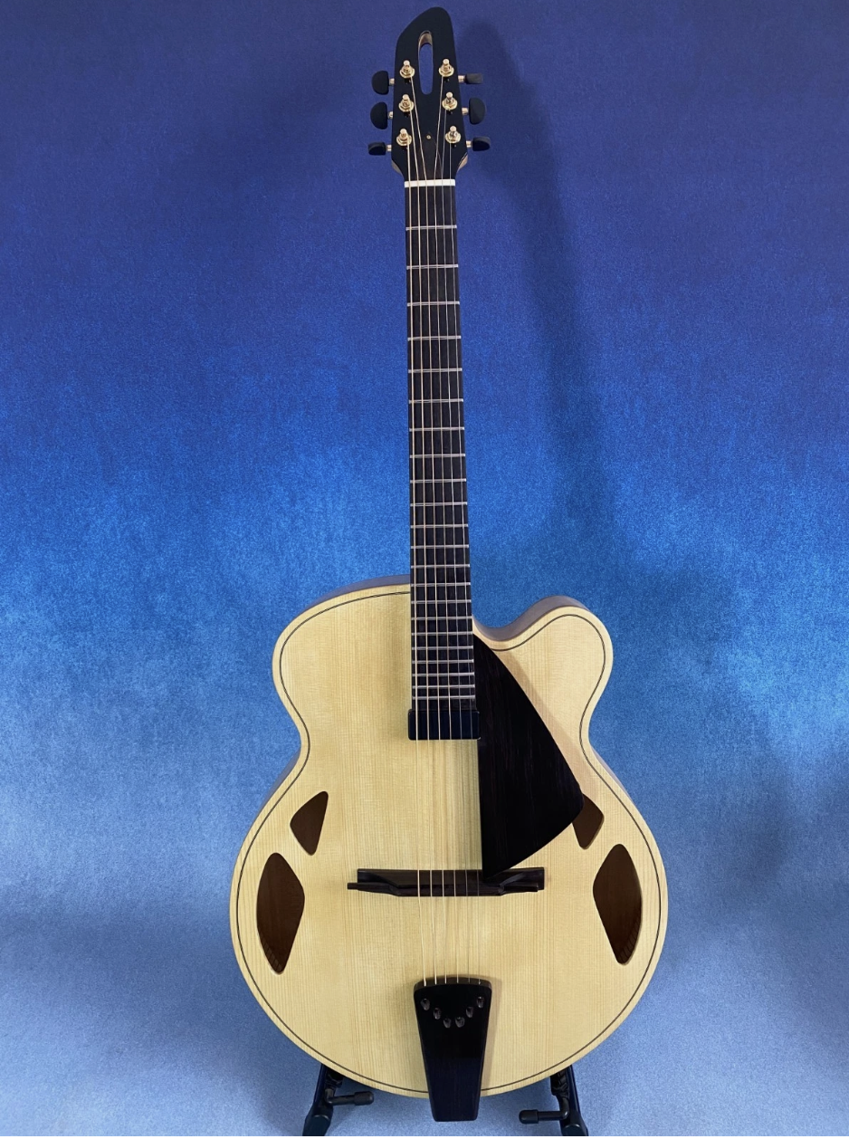 Looking for a guitar like these from Hancock-screenshot-2026-03-15-7-42-58 am-png